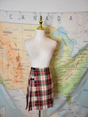 The Scotch House Red Plaid Wool Kilt With Leather Buckles.